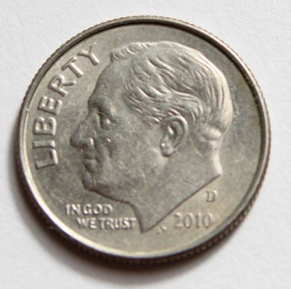 2010 dime doubled die error showing doubling on LIBERTY inscription under magnification
